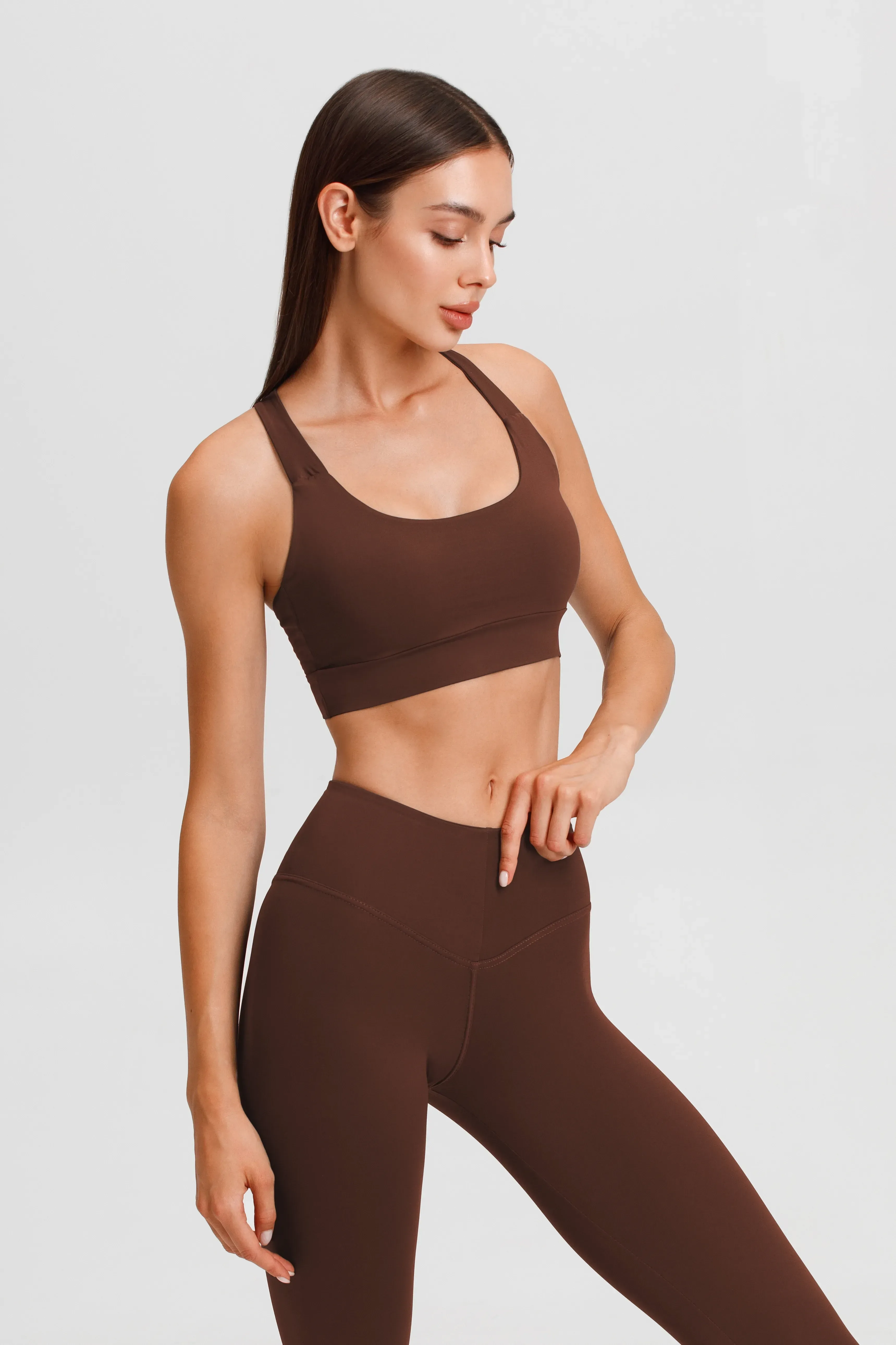 Evolve X applicators strapped to the abdomen and flanks for hands-free body contouring at Desert Oasis Wellness and Med Spa in Lake Havasu City